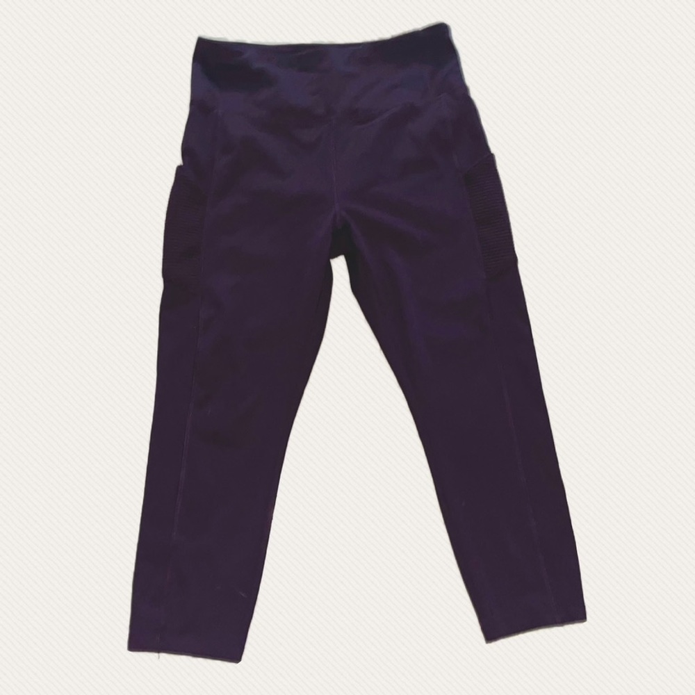 Dark purple leggings with textured pockets
